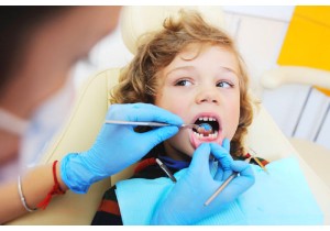 Удаление зуба у ребенка
